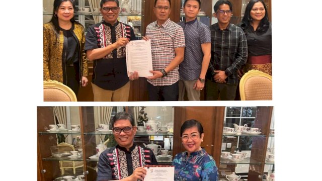 Abdul Rivai Ras menyerahkan SK DPD I Sulut dan DPD I Kepri Foto list.